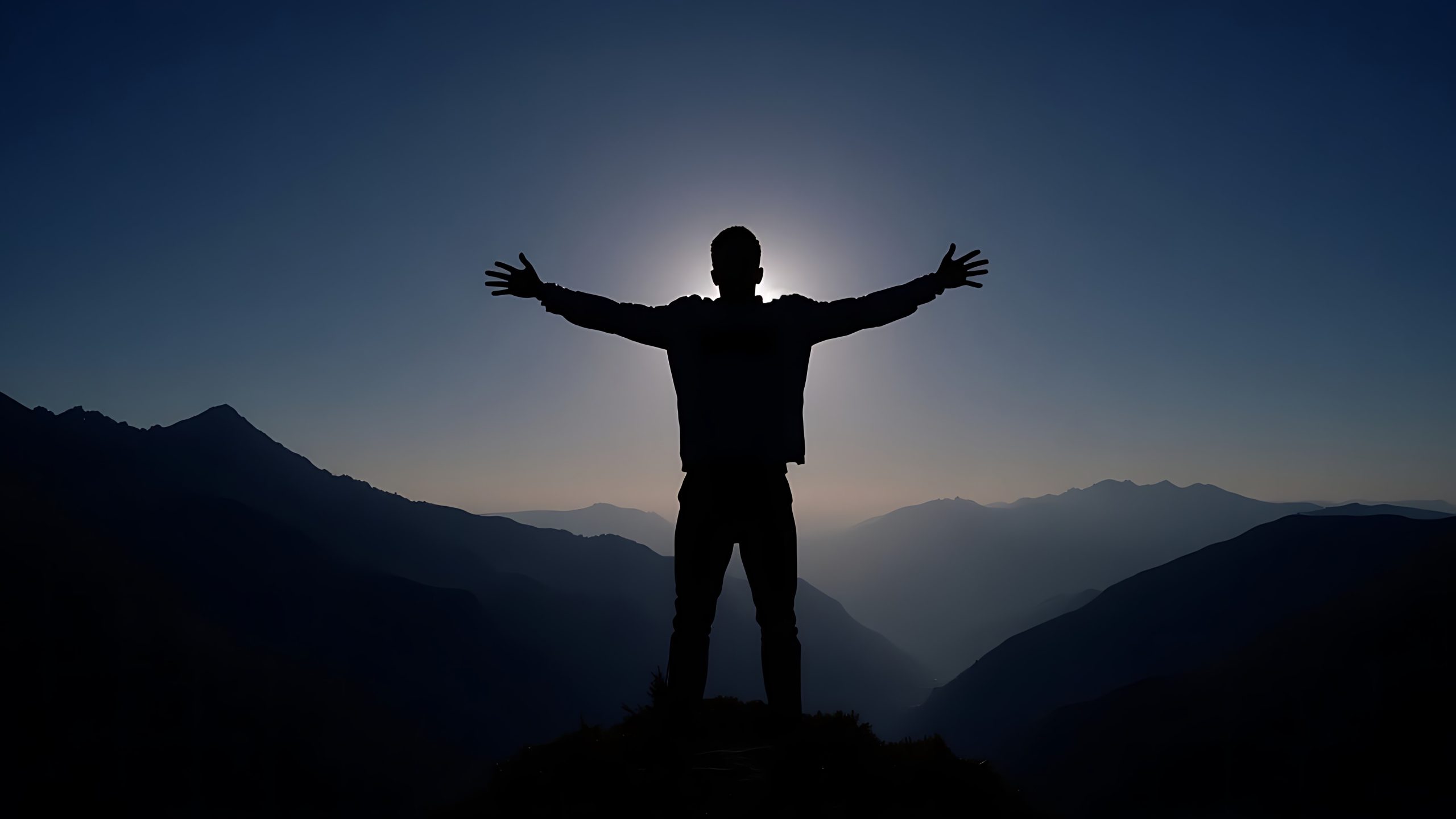 vecteezy a man standing on top of a mountain with his arms outstretched 68340370 scaled