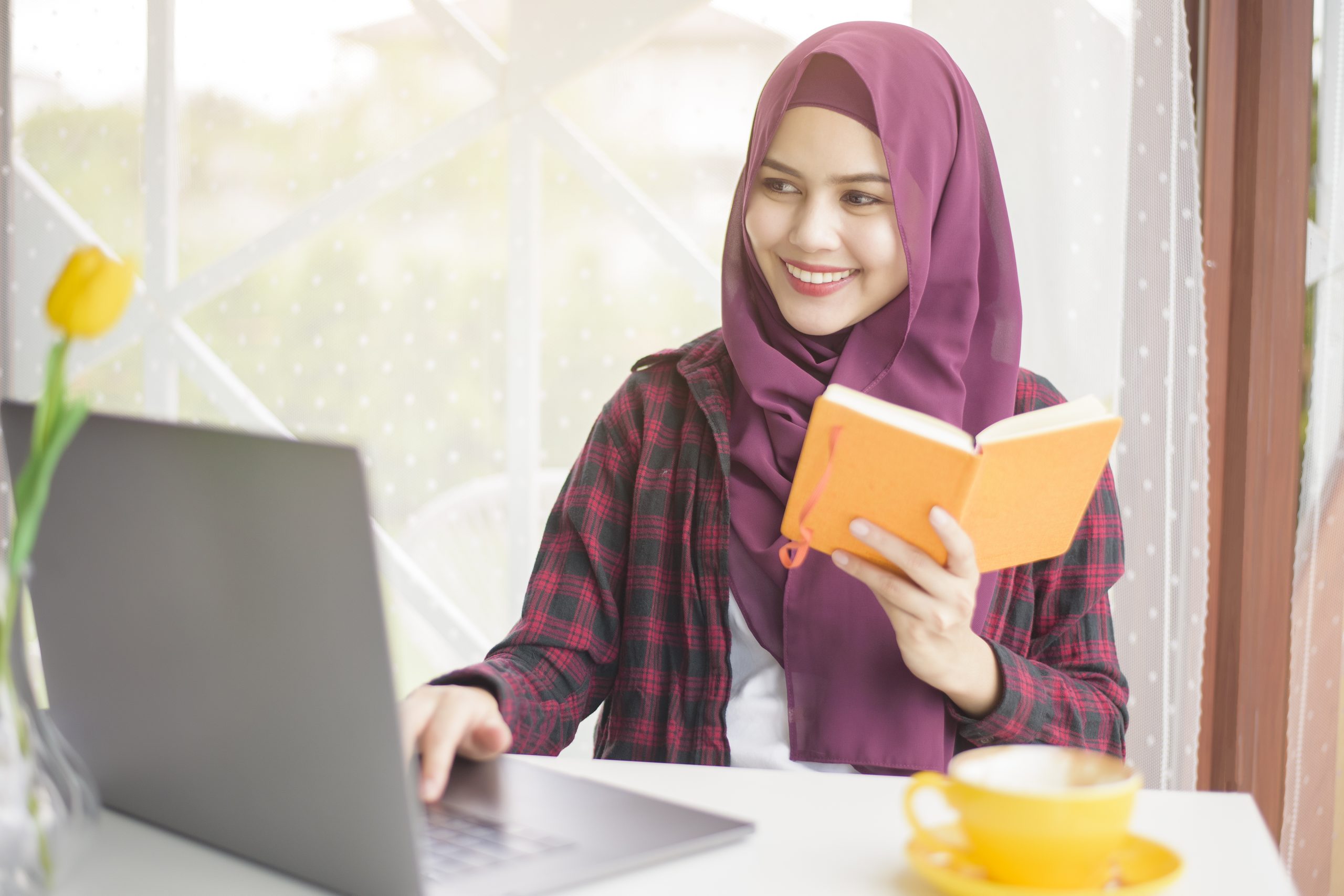 vecteezy muslim woman with hijab is working with laptop computer in 5129271 scaled